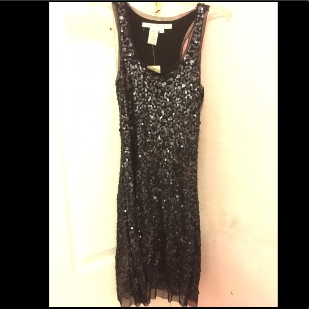 Sparkly sequin black dress.